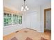 Bright breakfast nook featuring a window, stylish lighting, and closet storage at 305 River Birch Cir, Mooresville, NC 28115