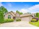 Beautiful brick home with an attached garage and well-kept lawn and garden at 305 River Birch Cir, Mooresville, NC 28115
