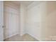 A walk-in closet with wire shelving, allowing ample space for organization and storage at 305 River Birch Cir, Mooresville, NC 28115