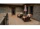 Inviting deck space with rocking chairs and potted flowers, offering a cozy spot to enjoy the outdoors at 3273 16Th Ne St, Hickory, NC 28601