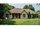 Charming brick home with lush lawn and manicured landscaping creates inviting curb appeal at 3273 16Th Ne St, Hickory, NC 28601