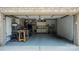 Well-organized garage featuring ample storage, workbenches, and a clean, painted floor at 3273 16Th Ne St, Hickory, NC 28601