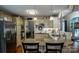 Well-equipped kitchen with granite countertops, tile backsplash, and ample cabinet space at 3273 16Th Ne St, Hickory, NC 28601