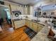 Modern kitchen with granite countertops, updated appliances, and seamless transition to dining area at 3273 16Th Ne St, Hickory, NC 28601
