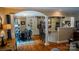 Open kitchen with granite countertops, stainless steel appliances, and adjoining breakfast nook at 3273 16Th Ne St, Hickory, NC 28601