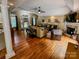 Open-concept living room with high ceilings, hardwood floors, and seamless flow for entertaining at 3273 16Th Ne St, Hickory, NC 28601
