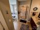 Relaxing main bathroom with a soaking tub, shower, and vanity with good lighting at 3273 16Th Ne St, Hickory, NC 28601