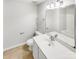 Clean bathroom with a white vanity, mirror, and tile flooring at 3436 Ibis Ln, Fort Mill, SC 29707