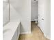 Bright bathroom featuring a white vanity and tile floors leading to a toilet area at 3436 Ibis Ln, Fort Mill, SC 29707