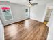 This bedroom has neutral decor and hardwood floors at 3436 Ibis Ln, Fort Mill, SC 29707