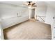 Open bonus room with neutral carpet, staircase and natural light at 3436 Ibis Ln, Fort Mill, SC 29707