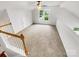 Spacious bonus room with neutral carpet, bright windows, and natural light at 3436 Ibis Ln, Fort Mill, SC 29707