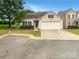 Charming single-Gathering home with a two-car garage and manicured landscaping at 3436 Ibis Ln, Fort Mill, SC 29707