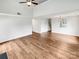 This is a large, open-concept living room with hardwood floors and lots of natural light at 3436 Ibis Ln, Fort Mill, SC 29707