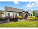 Backyard featuring a patio with outdoor dining and a charming pergola at 5357 Pembrey Dr, Denver, NC 28037