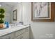 Stylish bathroom features a sleek vanity with a marble countertop and modern fixtures at 5357 Pembrey Dr, Denver, NC 28037
