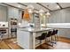 Beautiful kitchen showcasing gray cabinets, a large island, stainless steel appliances, and wood accents at 5357 Pembrey Dr, Denver, NC 28037