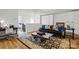 Charming living area with hardwood floors and comfortable seating arrangement perfect for relaxing at 5357 Pembrey Dr, Denver, NC 28037