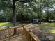 View from the deck of a backyard shed and lush forest backdrop at 5458 Foxcroft Dr, Fort Lawn, SC 29714