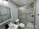 Bathroom showcasing a glass shower, white tile, and modern vanity at 5458 Foxcroft Dr, Fort Lawn, SC 29714