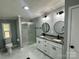 Modern bathroom featuring double vanity, granite counters, marble floors, and glass shower at 5458 Foxcroft Dr, Fort Lawn, SC 29714