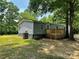 Charming one-story home with light green siding, a wooden porch, and large yard space at 5458 Foxcroft Dr, Fort Lawn, SC 29714