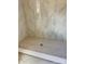 Bathroom featuring a tiled shower with neutral colored tiling in a home under construction at 63 Cornerstone Dr, Taylorsville, NC 28681