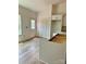 Unfinished kitchen featuring light cabinets and light wood floors in a home under construction at 63 Cornerstone Dr, Taylorsville, NC 28681