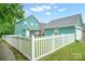 Spacious fenced backyard with a well-maintained lawn, providing a secure and private outdoor space at 7931 Baylis Dr, Huntersville, NC 28078