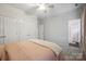 Bedroom featuring a large closet, neutral wall color, and soft carpet at 7931 Baylis Dr, Huntersville, NC 28078
