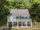 Aerial view of house with large lot and lake access including boat dock at 812 Bell Post Rd, Belmont, NC 28012