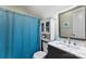 Compact bathroom featuring vanity and blue shower curtain at 812 Bell Post Rd, Belmont, NC 28012