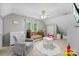 Neutral bedroom showcasing a crib, chair, table, and natural light at 812 Bell Post Rd, Belmont, NC 28012