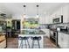 Modern kitchen with granite countertops, stainless steel appliances, and central island at 812 Bell Post Rd, Belmont, NC 28012