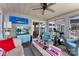 Bright sunroom with lake views and comfortable seating at 812 Bell Post Rd, Belmont, NC 28012