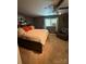 Bedroom with a large bed and chair at 850 And 830 E Nc 152 E Hwy, China Grove, NC 28023