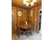 Dining area with a round table, chairs, and overhead light, offering a cozy place for meals at 850 And 830 E Nc 152 E Hwy, China Grove, NC 28023