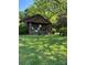 Charming bungalow with inviting front porch and rocking chairs, nestled in a lush green lawn and mature trees at 850 And 830 E Nc 152 E Hwy, China Grove, NC 28023
