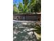 Spacious detached garage with ample storage, perfect for projects and parking, set on a gravel driveway at 850 And 830 E Nc 152 E Hwy, China Grove, NC 28023