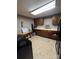 Kitchen featuring wood cabinets and laminate countertop at 850 And 830 E Nc 152 E Hwy, China Grove, NC 28023