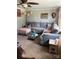 Open living room featuring a large grey sectional sofa at 850 And 830 E Nc 152 E Hwy, China Grove, NC 28023