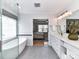Open en-suite bathroom with soaking tub, glass enclosed shower, and a view to the bedroom at 8608 Talbert Paige Ct, Charlotte, NC 28277