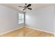 Bright bedroom features a ceiling fan and natural light from a window at 8608 Talbert Paige Ct, Charlotte, NC 28277
