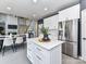 Open layout connecting the kitchen and living room creates a welcoming and spacious living space at 8608 Talbert Paige Ct, Charlotte, NC 28277