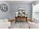 Bright home office with a large desk, stylish decor, and comfortable seating at 8608 Talbert Paige Ct, Charlotte, NC 28277