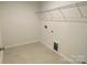Utility room featuring tile floors and wire shelving at 9108 Dulwich Dr # Ken0074, Charlotte, NC 28215