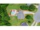 Stunning aerial view of a property with a fenced-in pool, gazebo, lush greenery, and well-maintained lawn at 1028 Pocono Pl, Newton, NC 28658