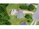A bird's-eye view of a property featuring a fenced-in pool, gazebo, and lush greenery, showcasing its private outdoor space at 1028 Pocono Pl, Newton, NC 28658