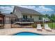 Backyard featuring spacious deck and patio area with in-ground swimming pool at 1028 Pocono Pl, Newton, NC 28658