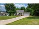 Well-maintained single-Gathering home with a neat lawn, driveway, and an attached garage providing a comfortable living space at 1028 Pocono Pl, Newton, NC 28658